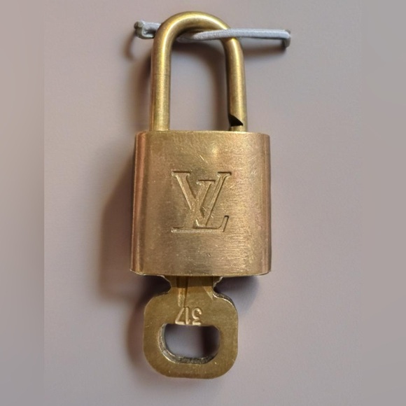 Louis Vuitton GOLD Lock & Key Gold tone Authentic. Number 317 MSRP $300 - Picture 1 of 6